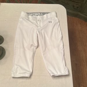 Women’s white under armor, softball pants med.